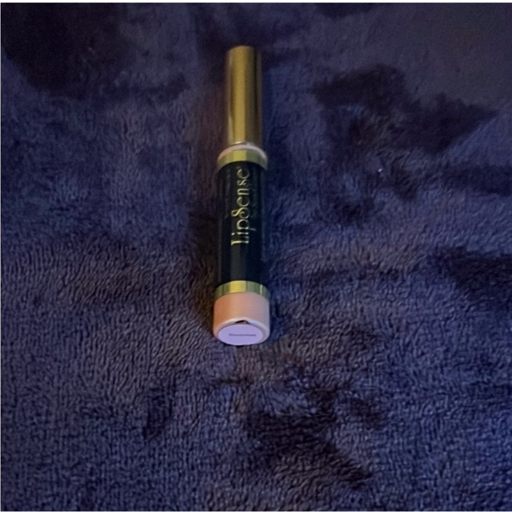 ( 15).  Lipsense lipstick Bombshell